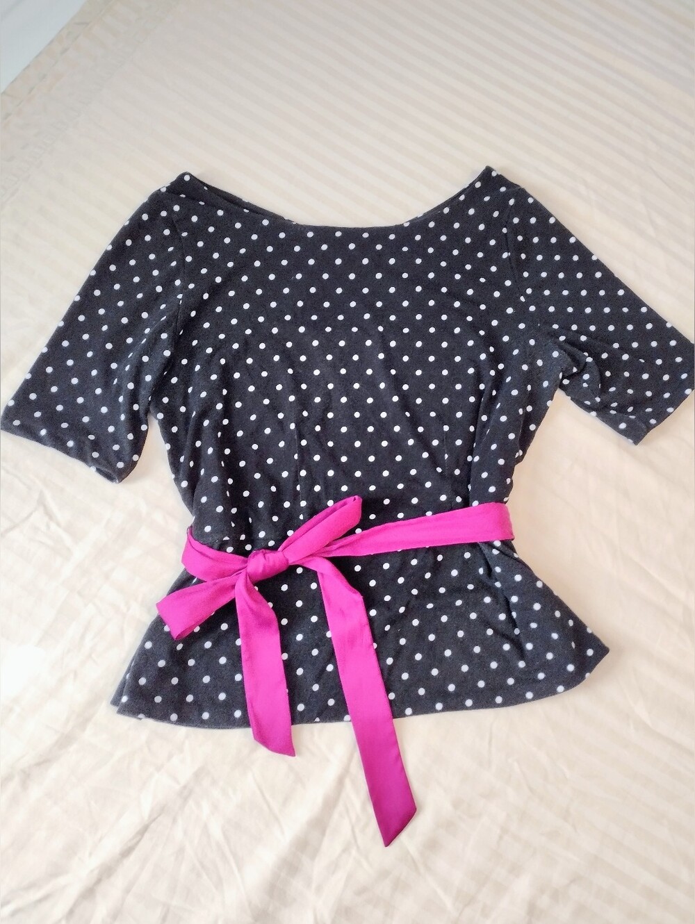Polka Dot Peplum Top with Pink Sash